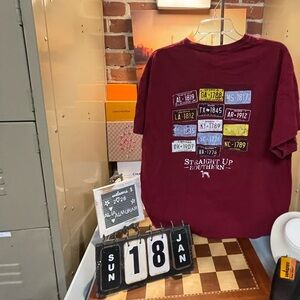 Straight Up Southern" t-shirt featuring a collage of state-themed license plates